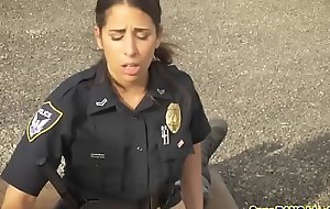 Busty female cops getting their cunts slammed hard in an open-air threesome!
