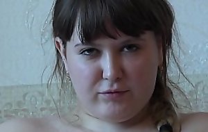 A chunky girl in pantyhose smokes added to then masturbates