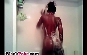 Ebony girl takes a hot and foamy shower