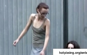 Two amateur gals from hotpissing.org peeing in public