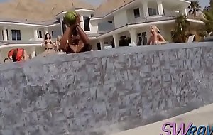 Stunning babes are fucking and moaning in a wild softcore swinger orgy.