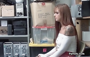 Beautiful redhead sneak-thief busted to suck cock