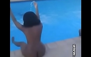 Beautiful African girls naked at one's fingertips pool