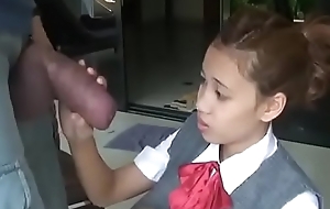 Asian schoolgirl opens yon there suck giving cock