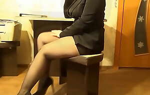 Pretty woman in pantyhose and heels