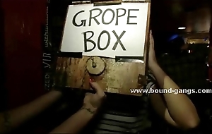 Babe head locked in wooden box is abused